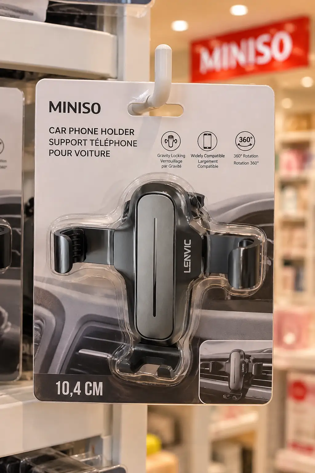 Miniso Lisanslı Yerçekimi Sensörlü Araç Telefon Tutucu – Izgara Tipi Stabil ve Güvenli Tutuş Gri 10,4 Cm