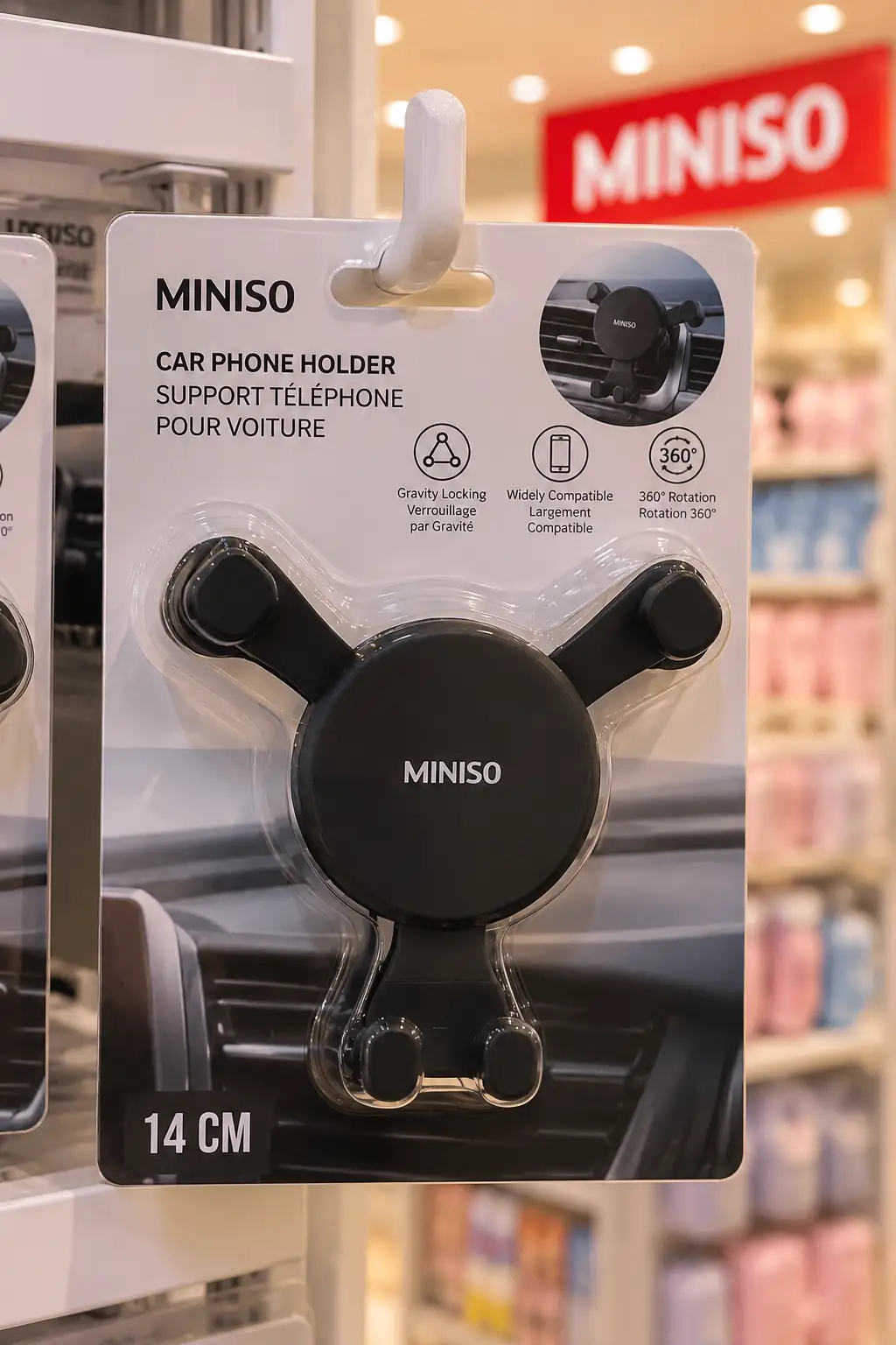 Miniso Lisanslı Yer Çekimli Araç Telefon Tutucu 14 Cm – Siyah Otomatik Sabitleme