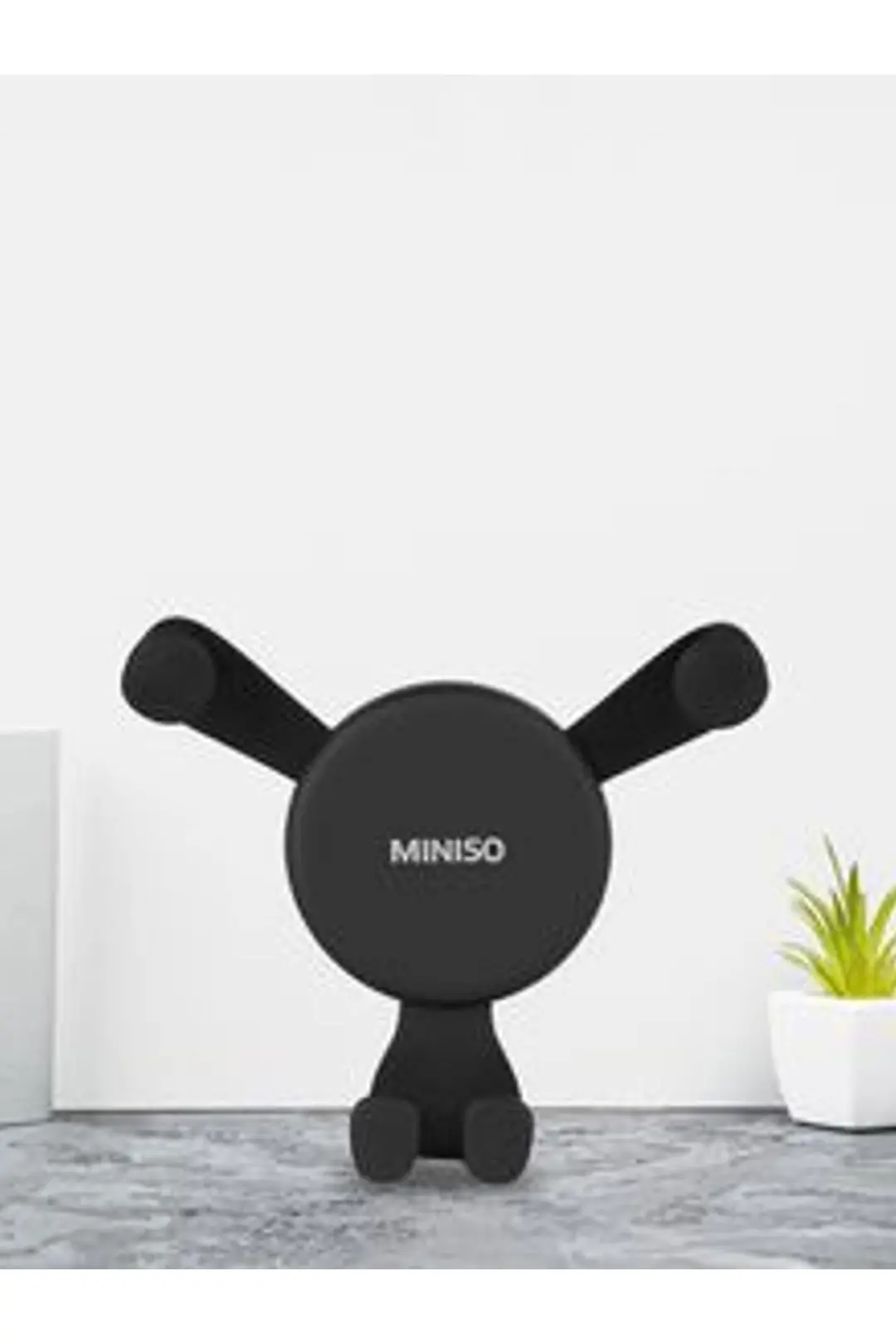 Miniso Lisanslı Yer Çekimli Araç Telefon Tutucu 14 Cm – Siyah Otomatik Sabitleme