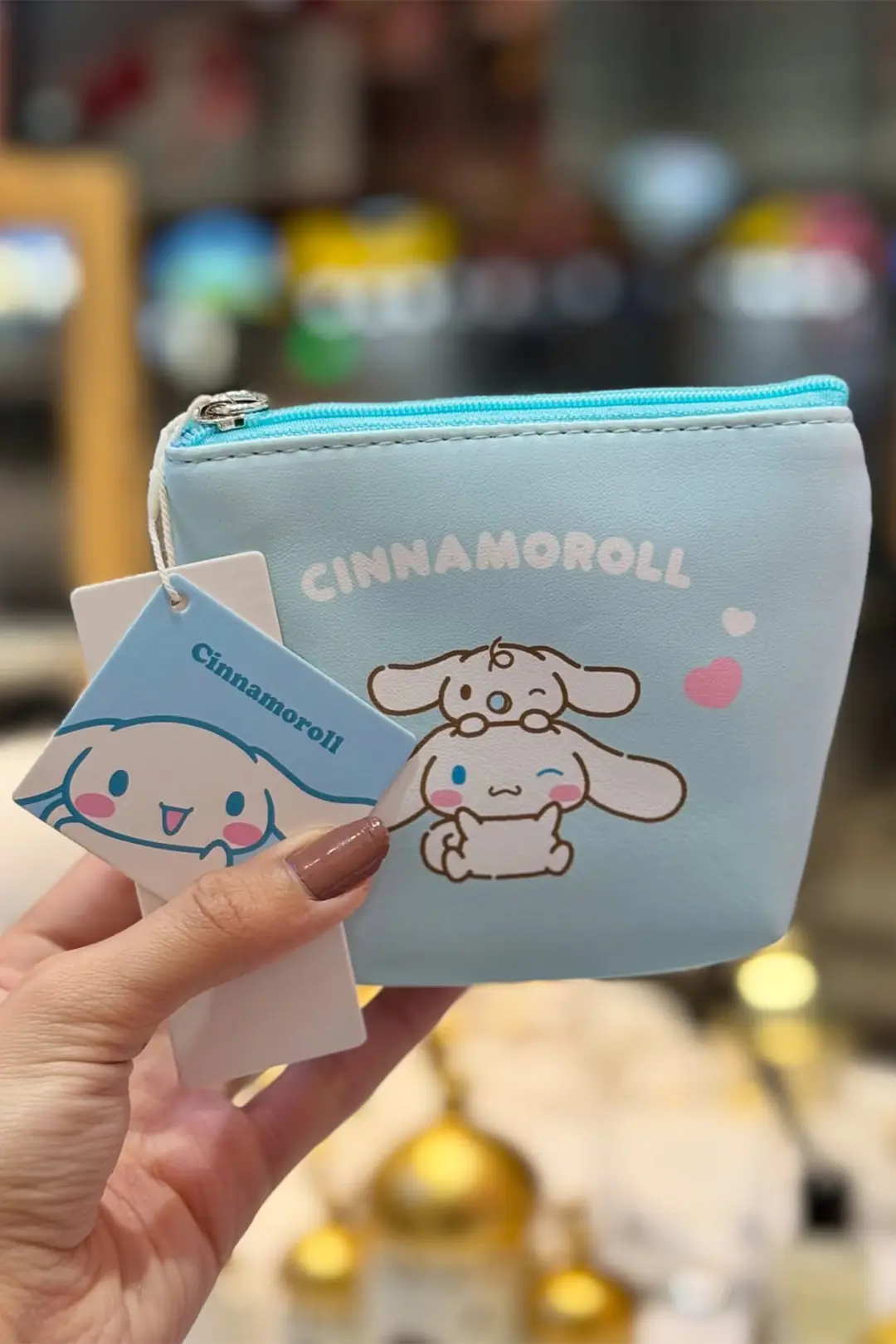 Sanrio Lisanslı Cinnamoroll Beşgen Mini Bozuk Para Çantası – Askılı PVC Makyaj ve Aksesuar Çantası 13 Cm